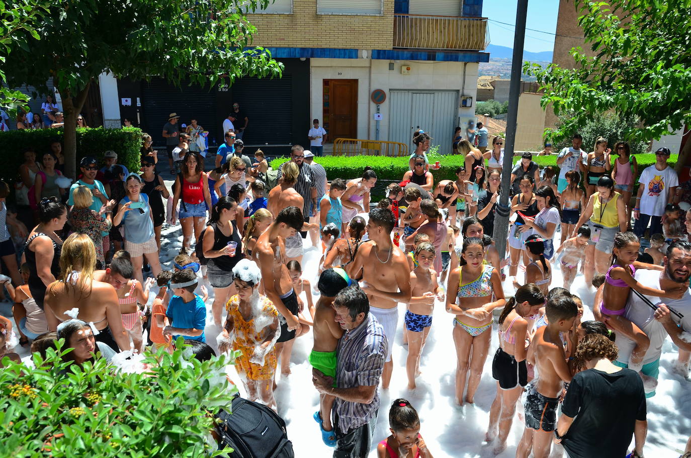 San Roque humedece el barrio de Caicena de Huétor Vega