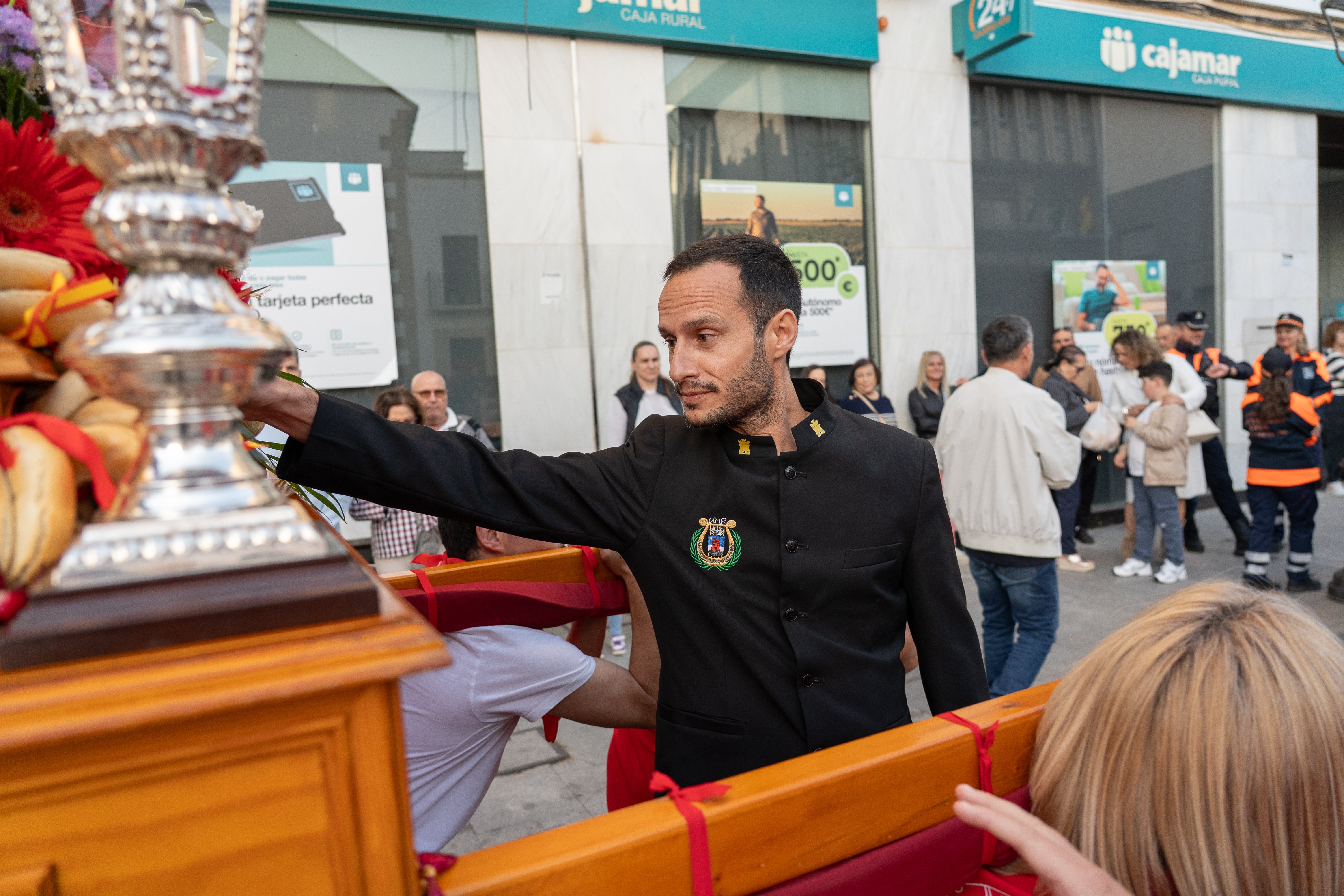 San Marcos recorre en procesión las principales calles de Roquetas, en imágenes