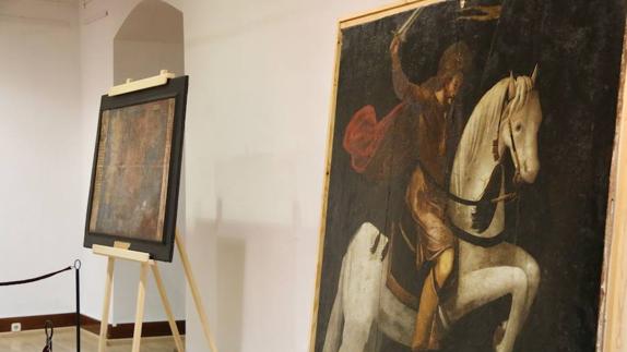 Vista de los dos cuadros restaurados.