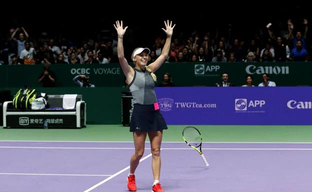 La danesa Caroline Wozniacki celebra la victoria. 