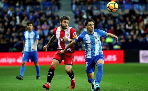 Girona Portu y Federico Ricca, en un momento del partido.