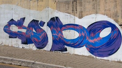 La calle Mirador del Genil de Granada atesora una veintena de murales que demuestran que Granada es la primera potencia en arte urbano