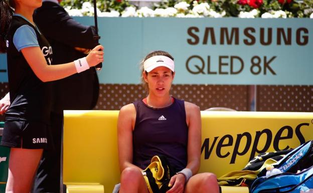 Garbiñe Muguruza, durante su primer y último partido en el Mutua Madrid Open.