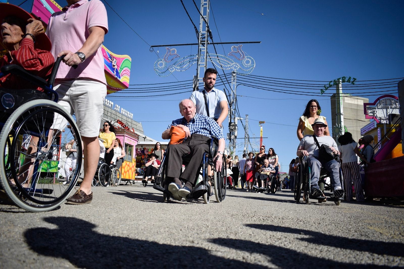 Fotos: Martes de columpios en el ferial