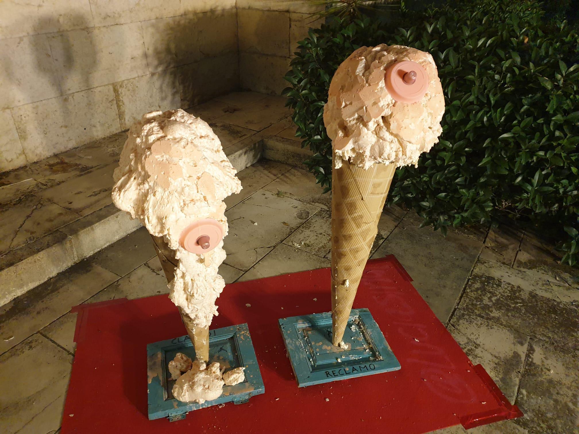 Una joven realiza un grafiti sobre un mural