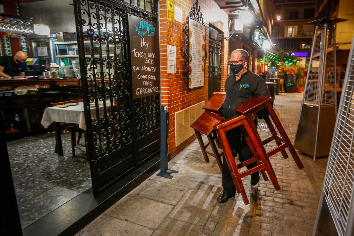 Fotos: Los locales del Centro cumplen con la norma de manera estricta