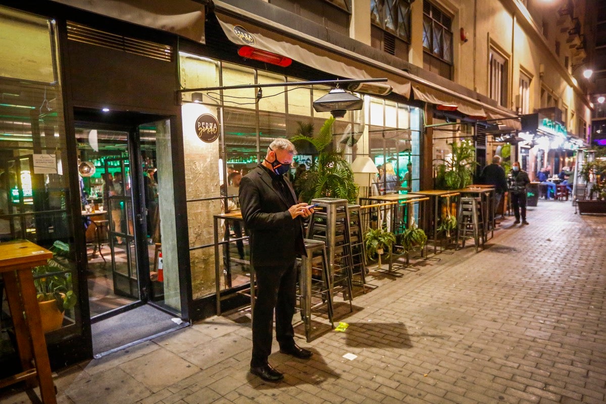 Fotos: Los locales del Centro cumplen con la norma de manera estricta