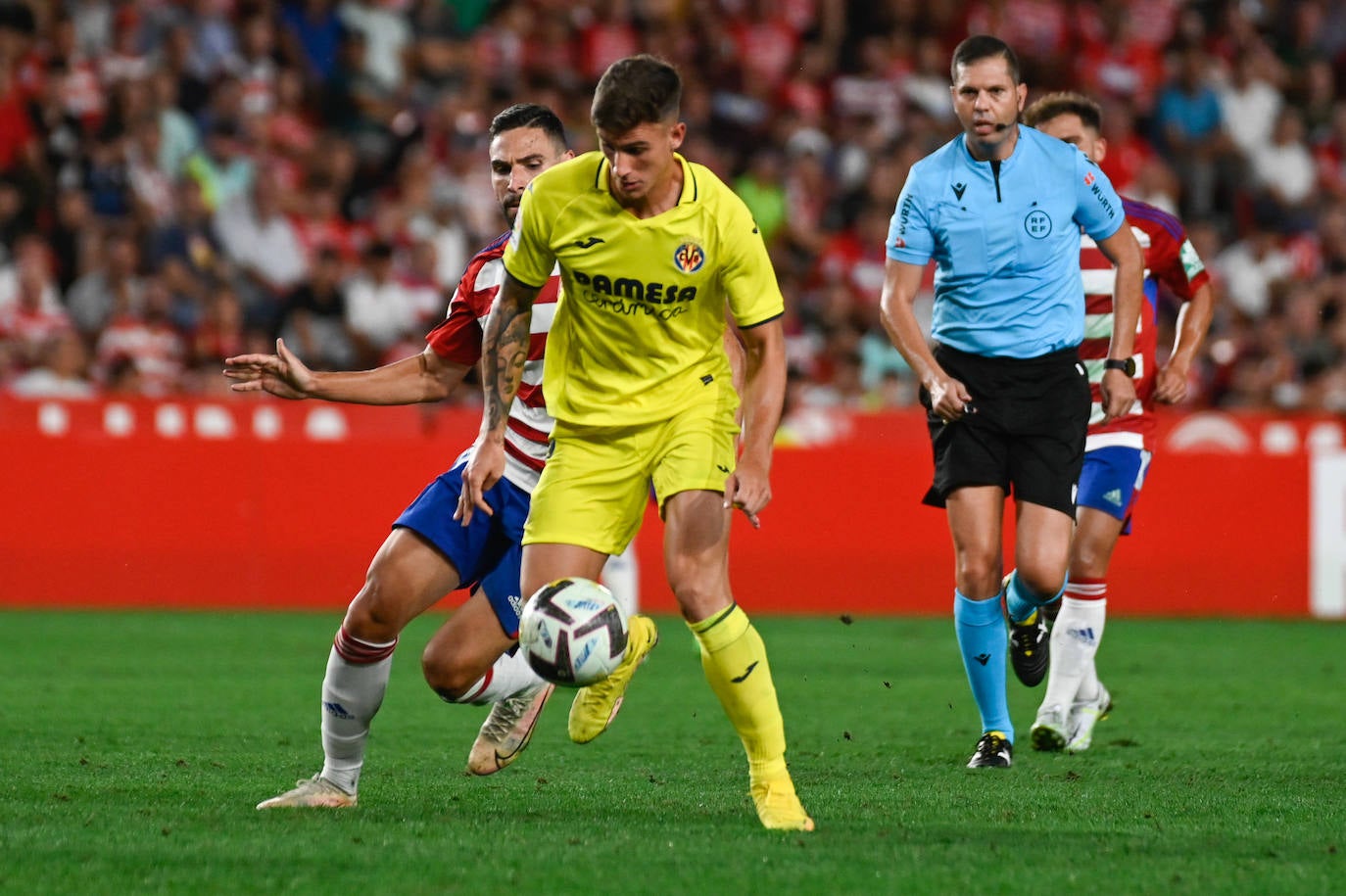 Repasa en fotos los mejores momentos del partido disputado este lunes en Los Cármenes