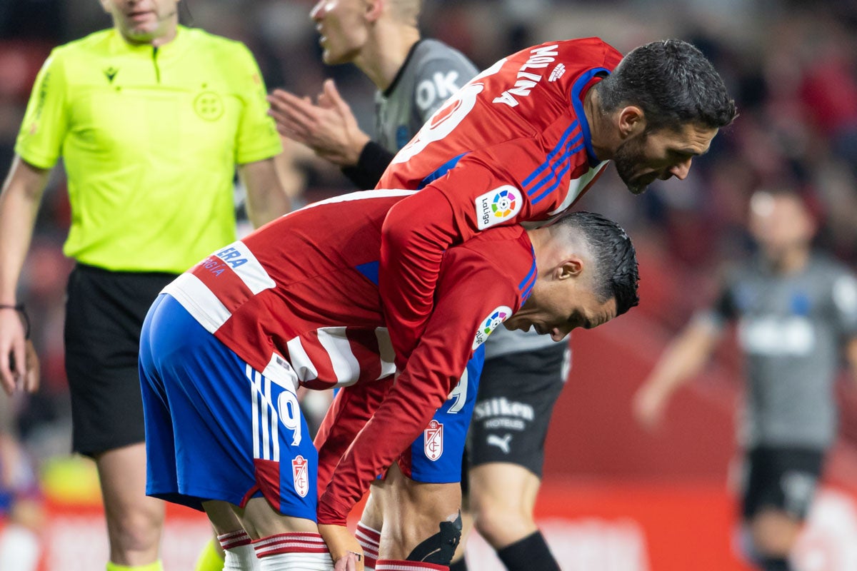 Las mejores imágenes del partido disputado este viernes en Los Cármenes