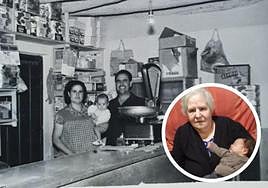 Patrocinio posa junto a uno de sus hijos y su marido en su tienda de ultramarinos en Cúllar Vega en 1961.