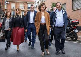 Carmen Calvo y José Entrena, a la derecha de la foto, en un acto en Granada.