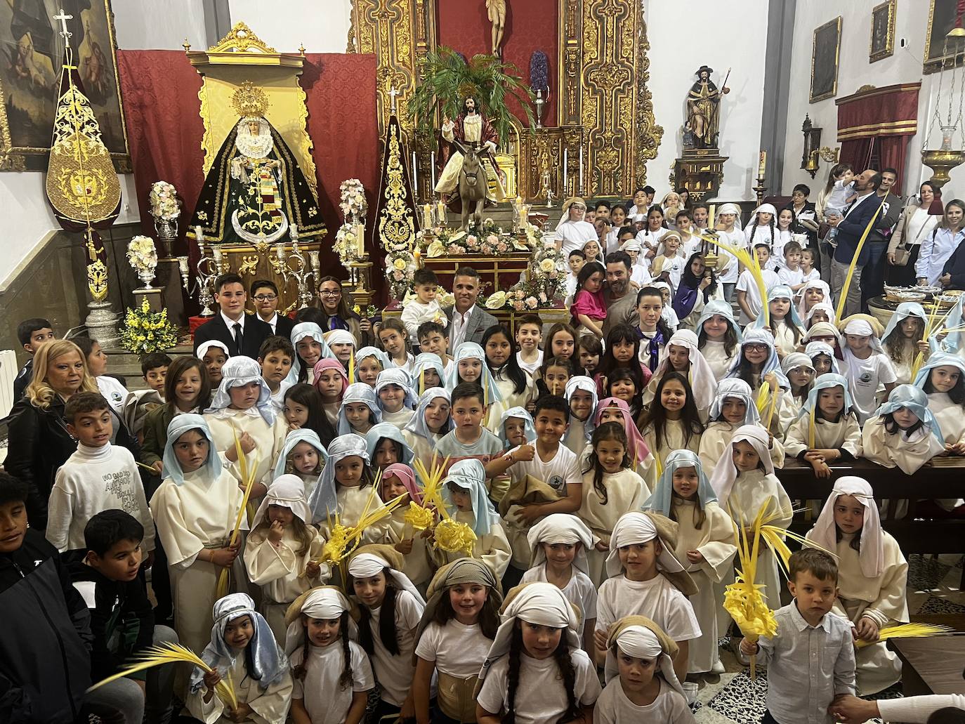 El ensayo y la bendición de la Borriquilla de Churriana de la Vega, en imágenes