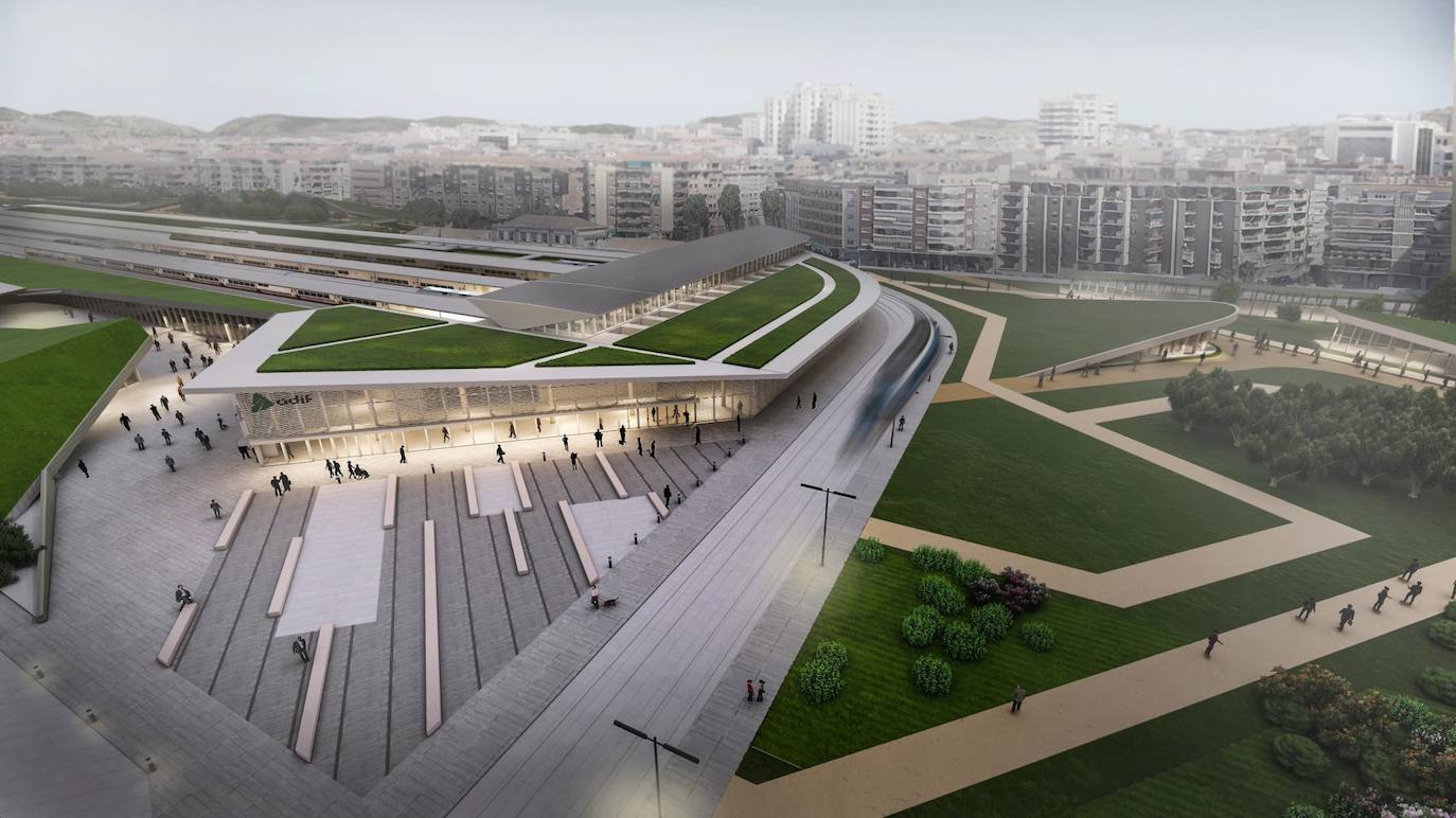 Vista de la estación de tren. Contempla un edificio principal reformado y rodeado de zonas verdes en los puntos que actualmente ejercen como almacén de material sin uso. Abajo se observa una nueva explanada de entrada a la terminal y a la derecha otro espacio verde en terrenos de Adif. Hacia la izquierda, en la zona inferior, la recreación muestra un nuevo intercambiador de autobuses.