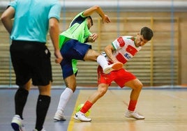 Una jugada del último partido del Sima Granada en el pabellón Núñez Blanca.