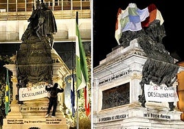 Estatua de Isabel y Colón cubierta por los activistas.