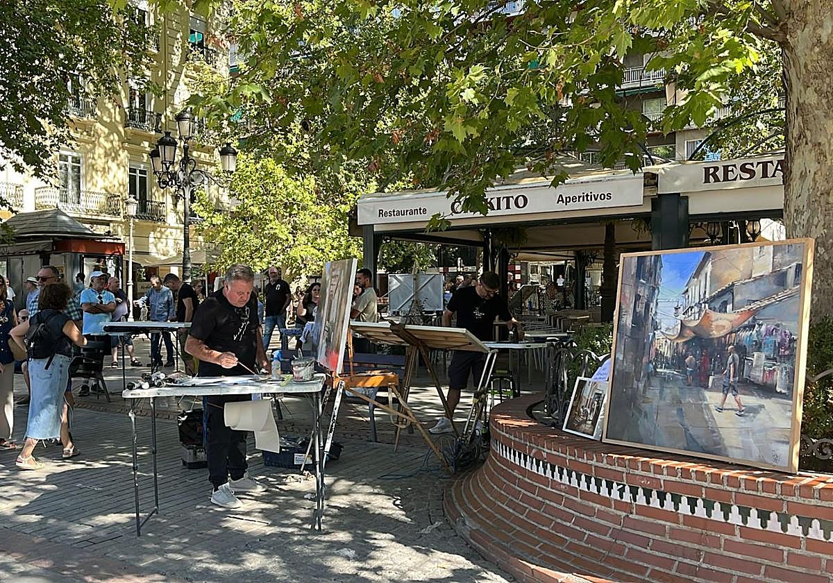 Juan Lucena, a la izquierda, y el cuadro en el que me colé.