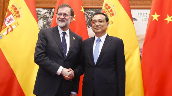 Mariano Rajoy posa junto a Xi Jinping.