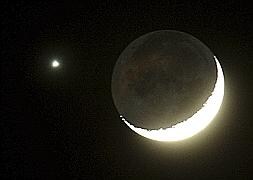 Venus, al lado de la Luna. / REUTERS