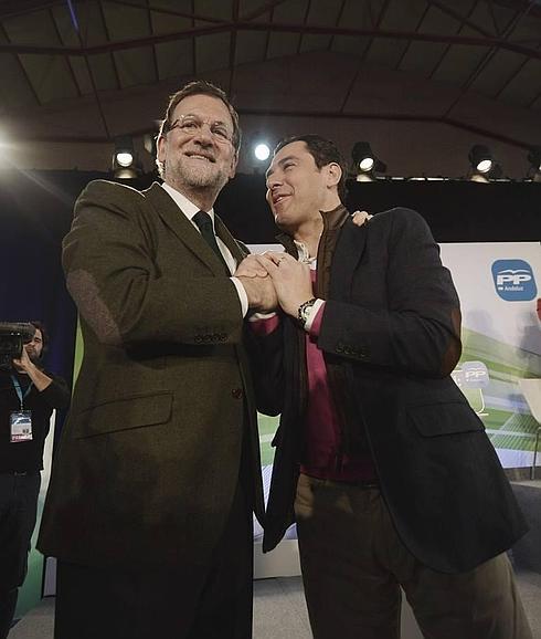 Mariano Rajoy y Juanma Moreno durante la campaña electoral.