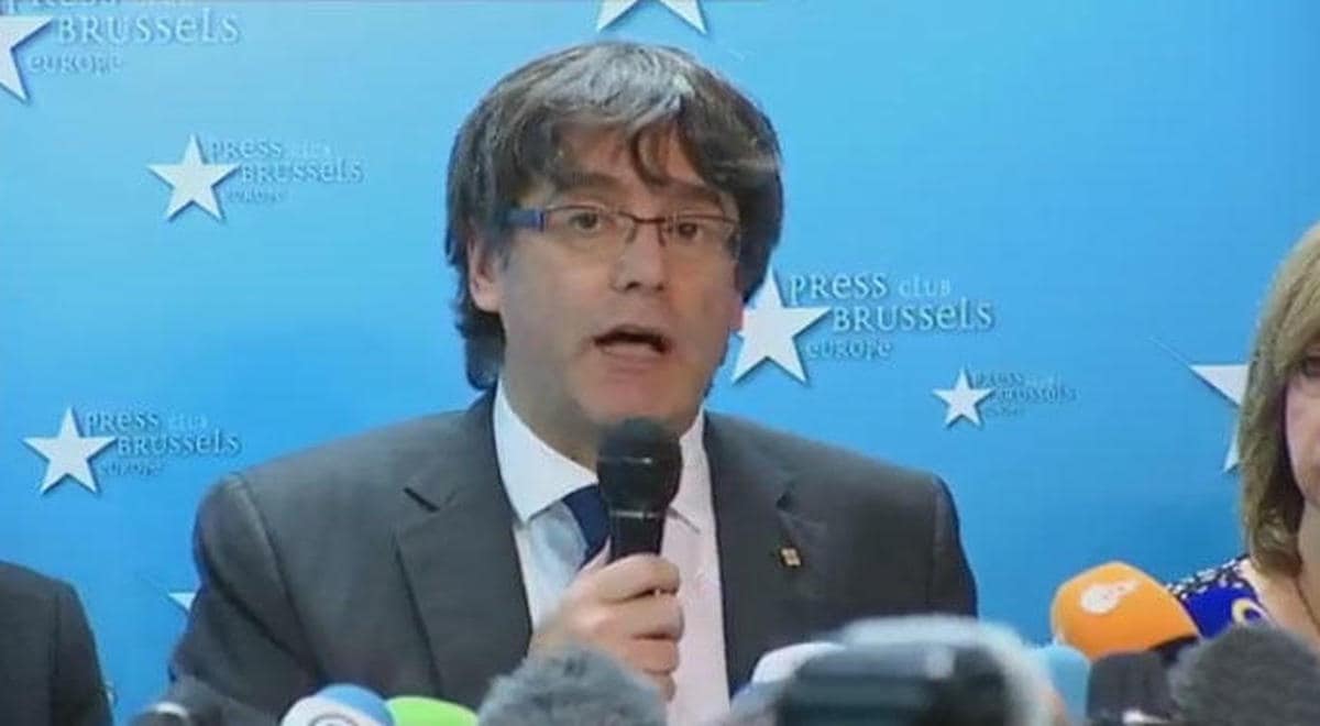 Puigdemont dice que aceptará las elecciones pero no volverá hasta que tenga garantías de un juicio justo
