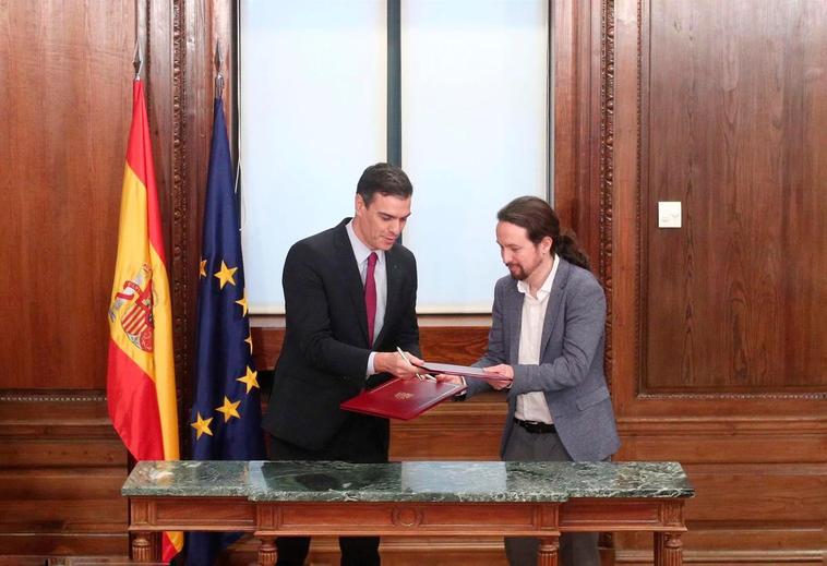 Pedro Sánchez y Pablo Iglesias durante el acto de presentación del programa de Gobierno del PSOE y Unidas Podemos.