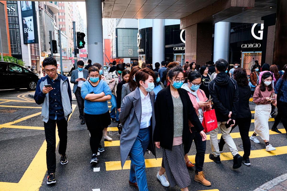 La mayor parte de los chinos usan mascarilla en los espacios públicos.