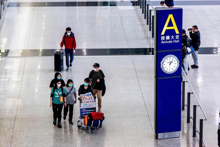 Pasajeros en un aeropuerto chino.