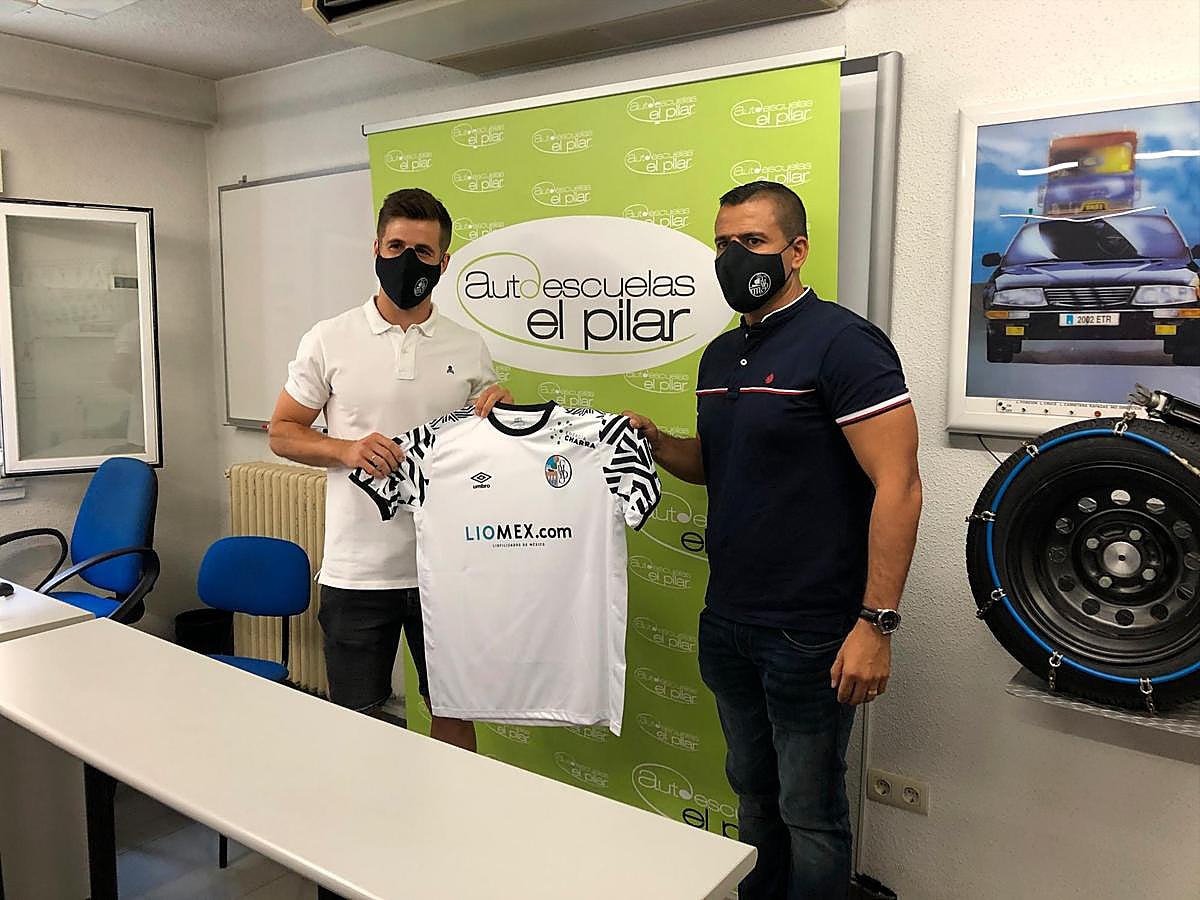 Fer Llorente y Rafa Dueñas, durante la presentación del centrocampista.