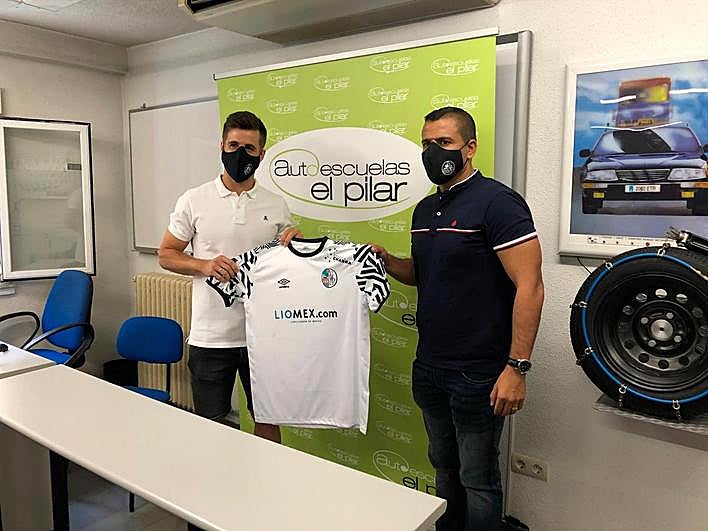 Fer Llorente y Rafa Dueñas, durante la presentación del centrocampista.