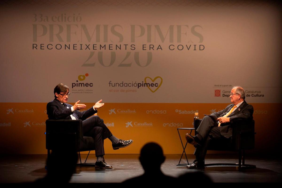 El Ministro de Sanidad, Salvador Illa, siendo entrevistado por el presidente de Pimec, Antoni Cañete.