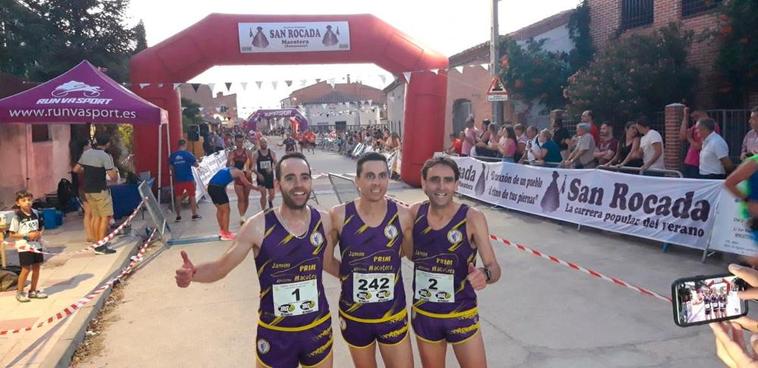 Nacho Sánchez, ganador de la prueba, junto a sus compañeros de podio Juan y Roberto Bueno