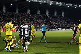Jugadores de Unionistas y del Villarreal en el partido de la Copa del Rey de este domingo