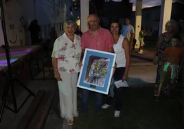 Clemente recibió un cuadro como regalo del homenaje