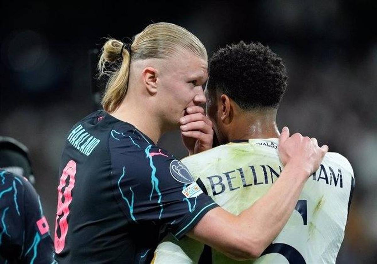 Los futbolistas Erling Haaland (Manchester City) y Jude Bellingham (Real Madrid) conversan en un partido de Champions.