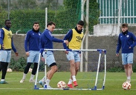 Souley, Óscar Lorenzo, De Tomás, Murua y Cristeto en el entrenamiento del viernes en el anexo.