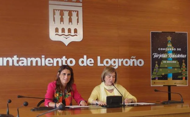 Isabel Moreno y Paloma Corres presentan el concurso de tarjetas navideñas. 