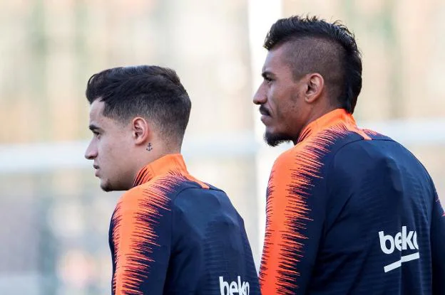 Countinho y Paulinho, en el entrenamiento de ayer. :: efe