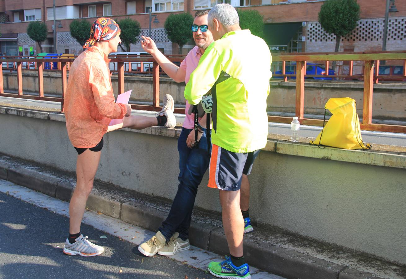 Imágnes de la salida de los participantes en la Media Maratón de La Rioja.