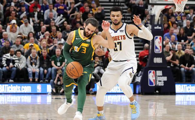 Ricky Rubio sube el balón.