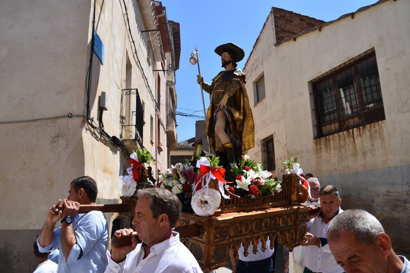 Fotos: Procesión en el día grande de las fiestas de San Roque en Tudelilla