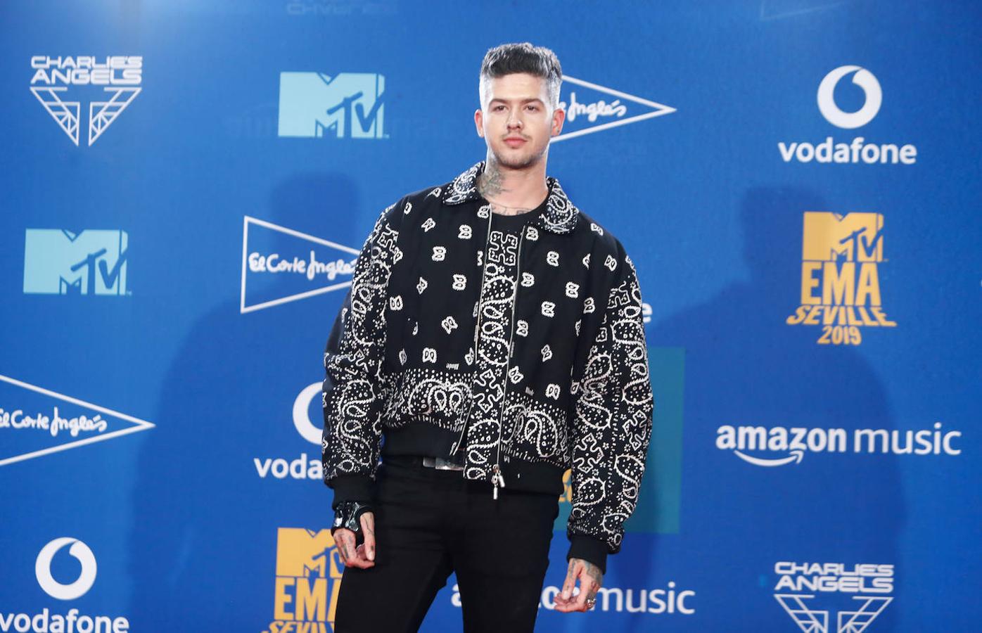 Travis Mills posa en el photocall de los MTV.