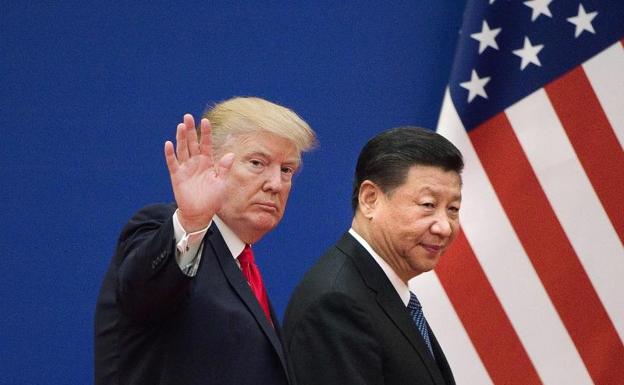 Los presidentes Trump y Xi Jinping. 