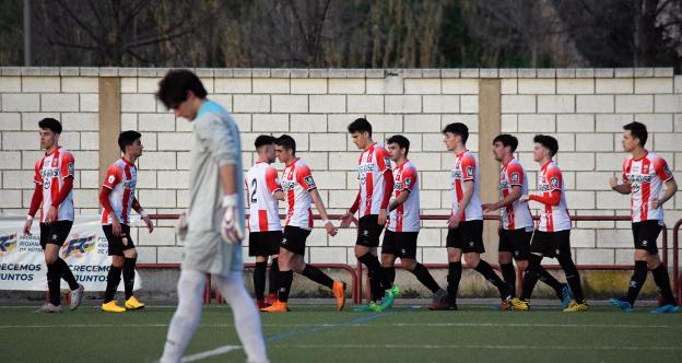 Jugadores de la UDL, tras un gol en un choque anterior. 