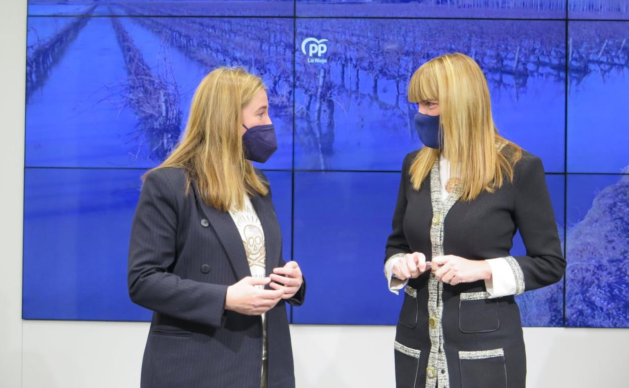 Manzanos y González, antes de su intervención. 