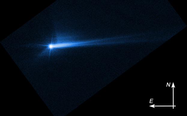 La imagen del Telescopio Espacial Hubble de la NASA del 8 de octubre de 2022 muestra los escombros arrojados desde la superficie de Dimorphos 285 horas después de que el asteroide fuera impactado intencionalmente por la nave espacial DART.