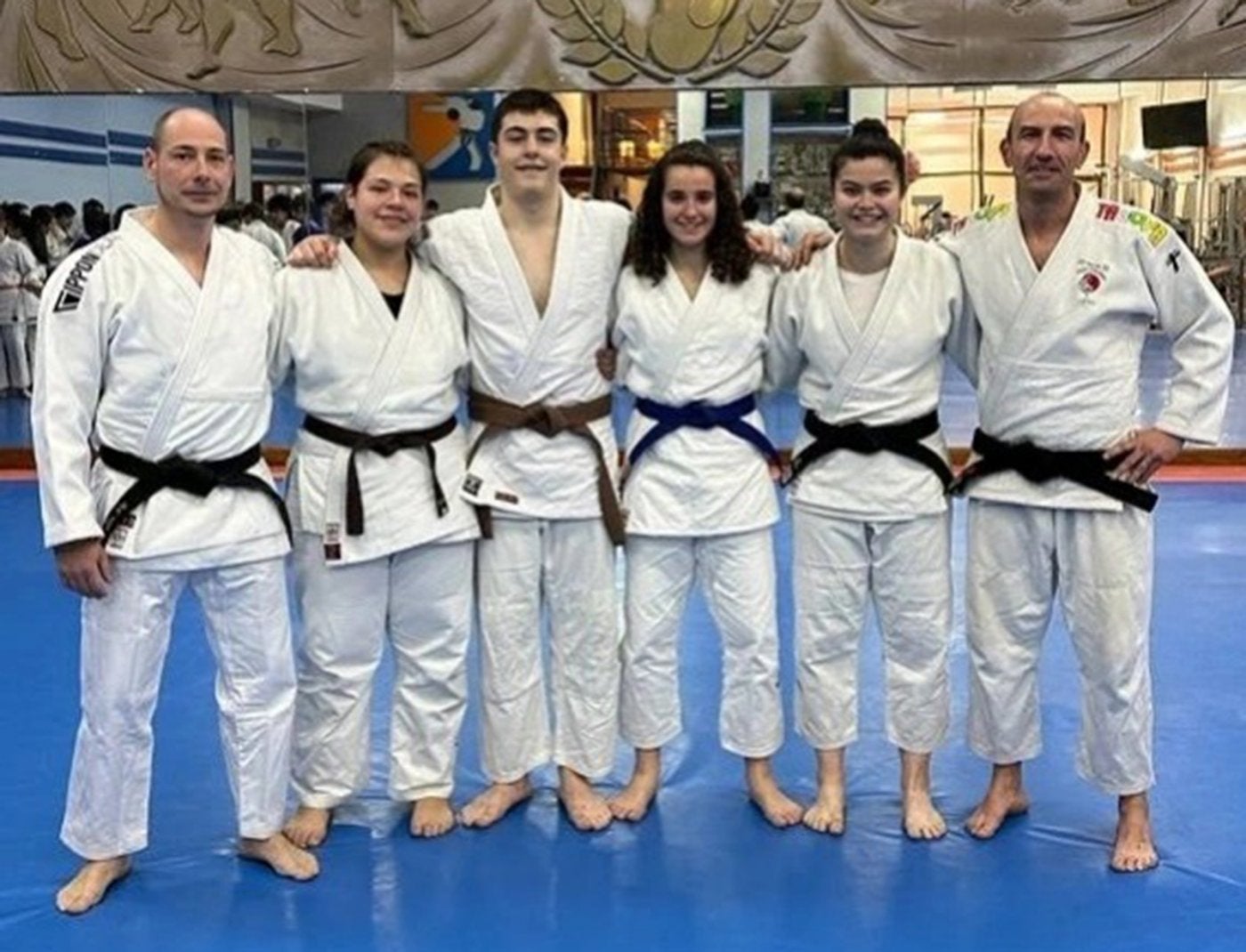 Los tres seleccionados con sus entrenadores.