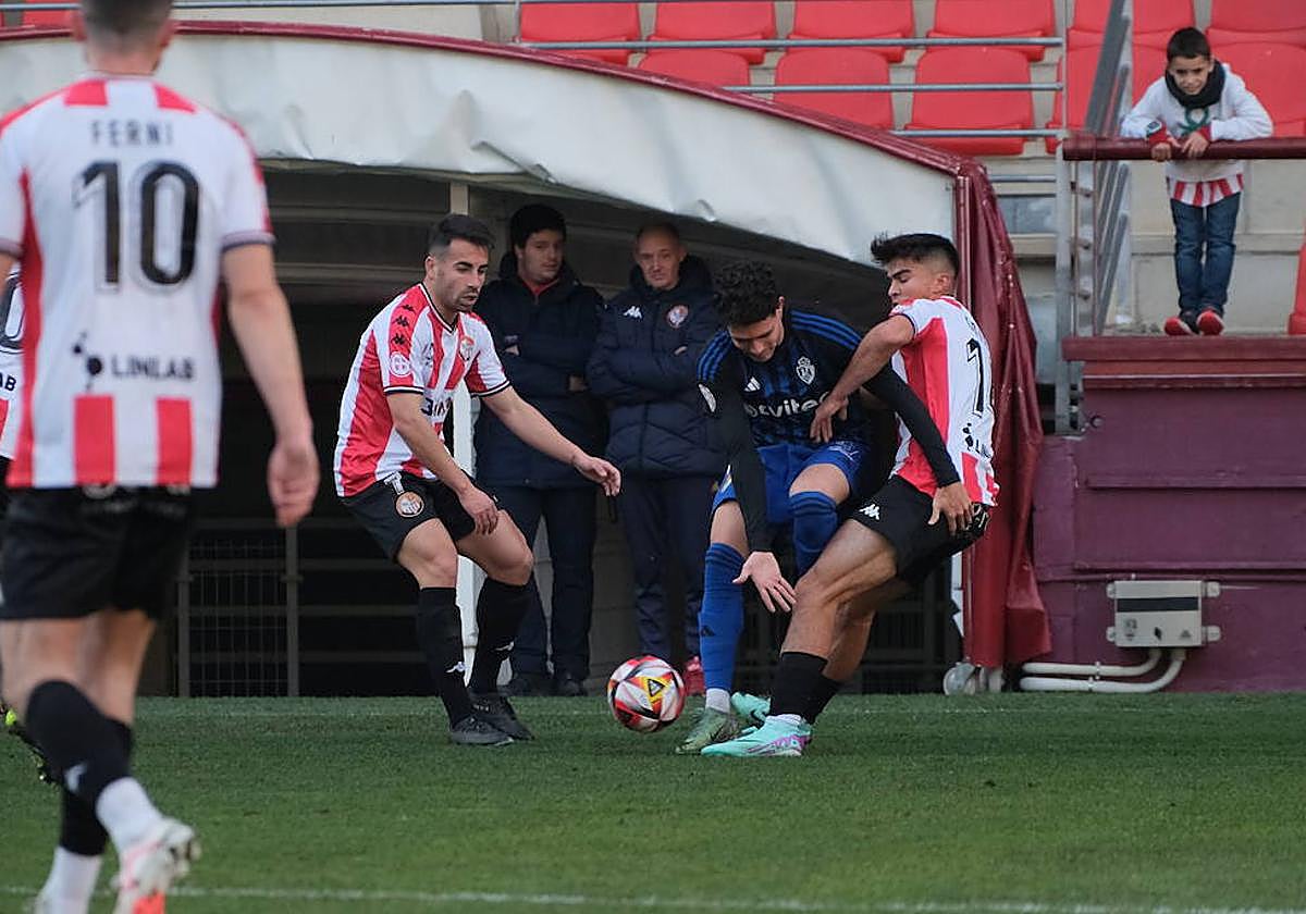 Un lance del partido.