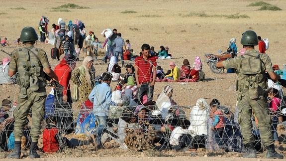 Refugiados kurdos .en la frontera de Turquía. 