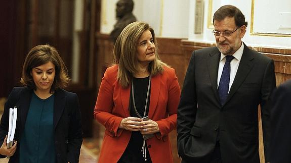 Sáenz de Santamaría, Báñez y Rajoy.