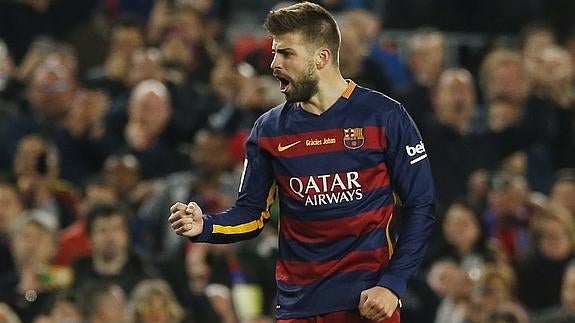 Gerard Piqué celebra su gol al Real Madrid. 